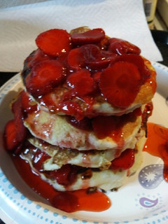 A picture of Old Fashioned fluffy Strawberry Pancakes.