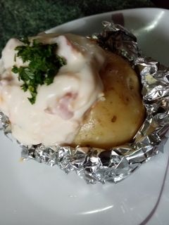 Una foto de Papa al horno con tocino