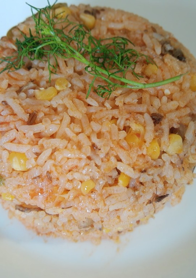 Una foto de Arroz rojo con Maíz