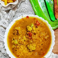 Phulkopi diye Bhaja Mug Dal/ Bengali style Dal with Gobi A picture of Phulkopi diye Bhaja Mug Dal/ Bengali style Dal with Gobi.