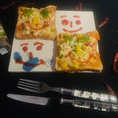 A picture of Emoji Bread pizza.