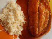 Una foto de filetes con salsa barbacoa