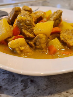 Una foto de Magro de cerdo al curry con zanahorias