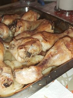 Una foto de Muslitos de pollo al horno
