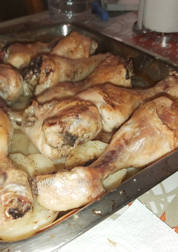 Una foto de Muslitos de pollo al horno
