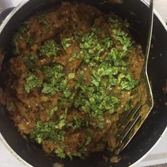 A picture of Vangyache Bharit Aka Baigan Bharta Aka Mashed Aubergines.