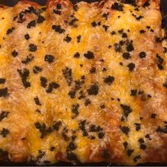 A picture of Ground Beef Enchiladas.