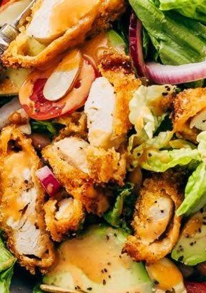 A picture of Chicken nugget salad.