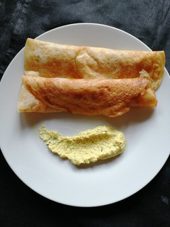 A picture of Wheat flour dosa with maxican salsa.