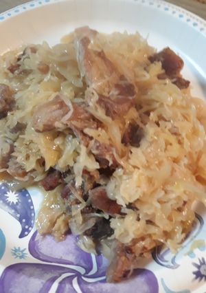 A picture of Sauerkraut and Crispy Porksteak.