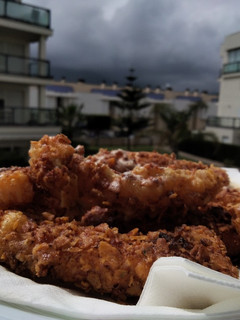 Una foto de Queso frito con nachos de queso