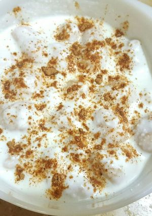 A picture of Dahi Bara /Yogurt with lentil dumplings.