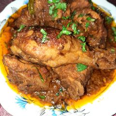A picture of Fry chicken with gravy.