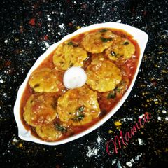 A picture of Sindhi Besan tikki Curry.
