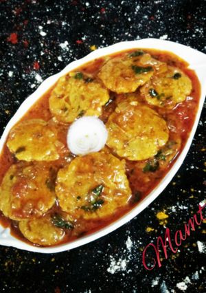 A picture of Sindhi Besan tikki Curry.