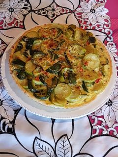 Una foto de Masa casera: tarta de zapallitos+tartita de jamón+dos empanadas