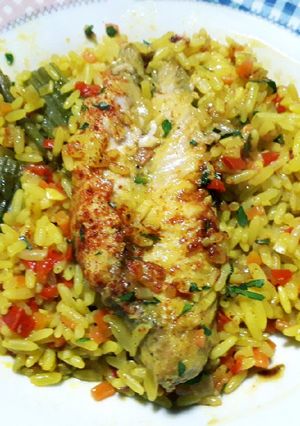 Una foto de Pescado con arroz