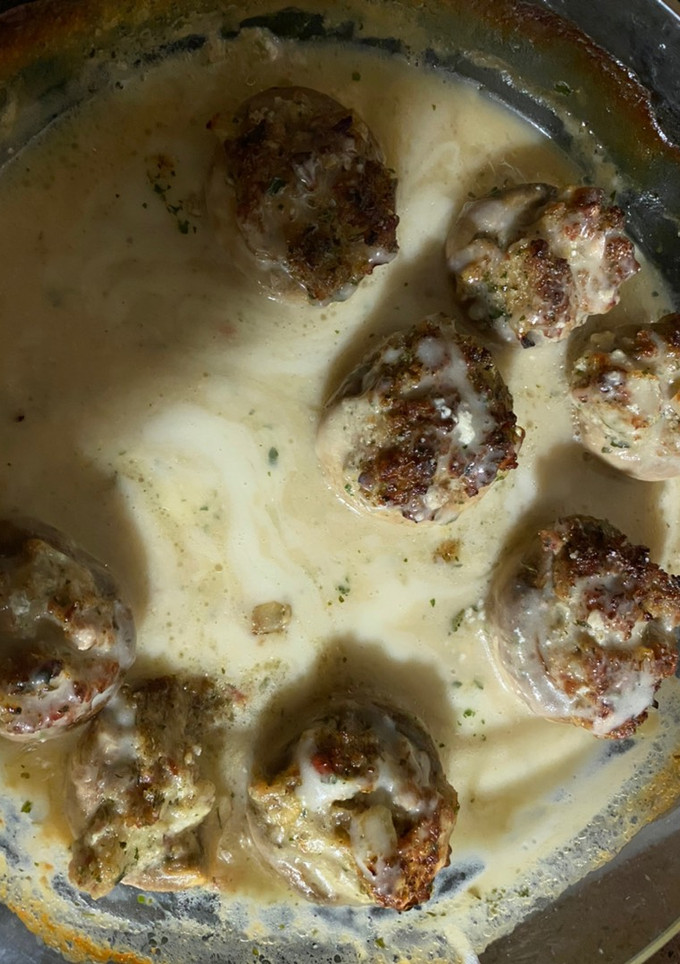 Una foto de Champiñones rellenos & bechamel, la pareja perfecta