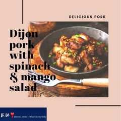 Dijon pork with spinach & mango salad A picture of Dijon pork with spinach & mango salad.