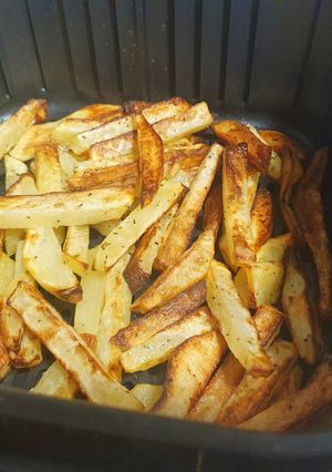 A picture of French Fries in Cosori Air Fryer.