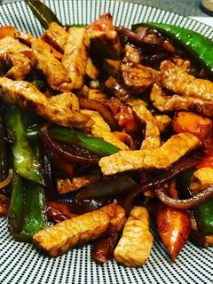 Una foto de Lomo de cerdo saltado