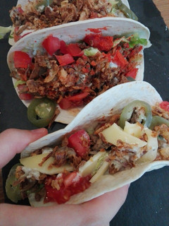 Una foto de Tacos estilo americano picantes