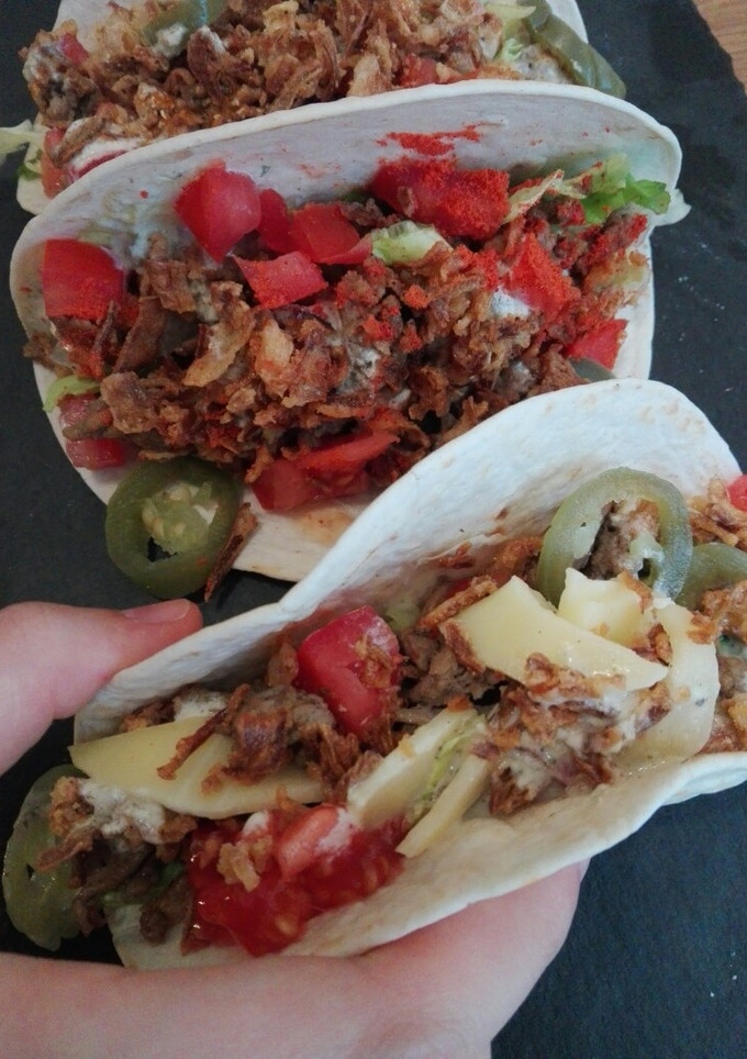 Una foto de Tacos estilo americano picantes