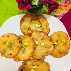 A picture of Fruit milk powder Malpua.
