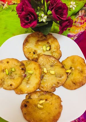 A picture of Fruit milk powder Malpua.