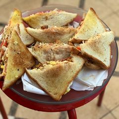 A picture of Chicken tikka Club Sandwiches.