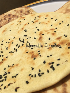 A picture of Sesame naan bread.