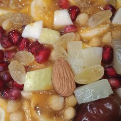 A picture of Colorful fruit and nuts chat.
