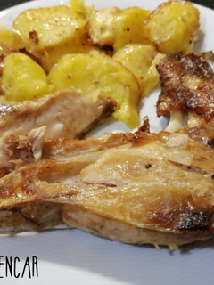 Una foto de Cabeza de corvina al horno con patatas