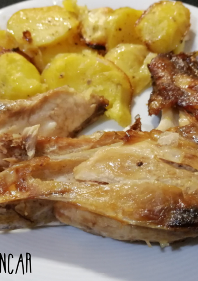 Una foto de Cabeza de corvina al horno con patatas