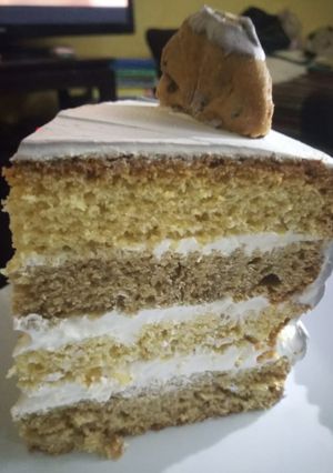 A picture of Coffee and orange cake.