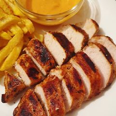 A picture of Orange flavoured skillet grilled chicken breast.
