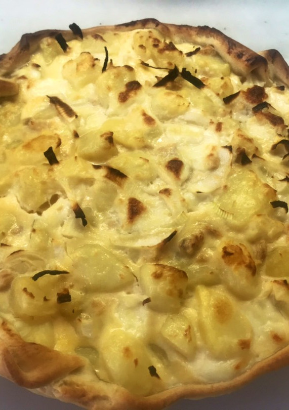Una foto de Tarta salada de atún y papas