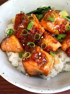 A picture of Salmon Rice Bowl with Chilli Oyster Sauce.