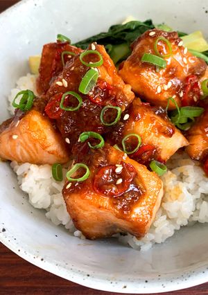A picture of Salmon Rice Bowl with Chilli Oyster Sauce.