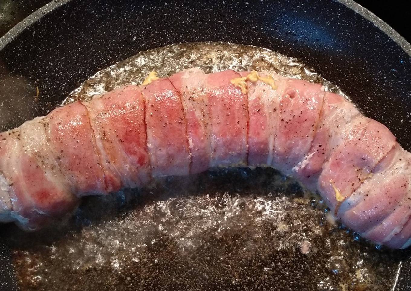 Pork fillet wrapped in bacon