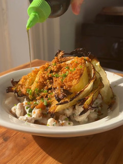 A picture of Charred Cabbage & Cheat Caesar Beans.