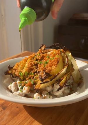 A picture of Charred Cabbage & Cheat Caesar Beans.