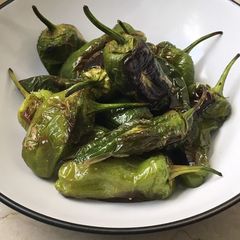 A picture of Charred Padron Chilli Peppers.