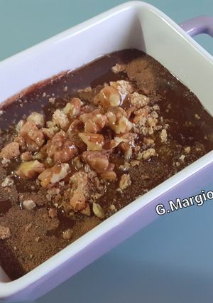 Foto di Budino di cachi con cacao, noci, amaretti, cannella e miele !