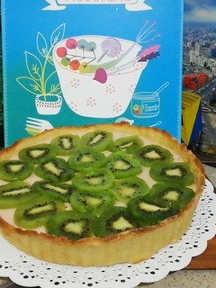 Una foto de Kuchen de kiwi