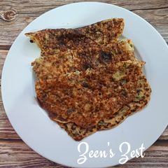 A picture of Flattened Rice and Amaranth Greens Savoury Pancakes.