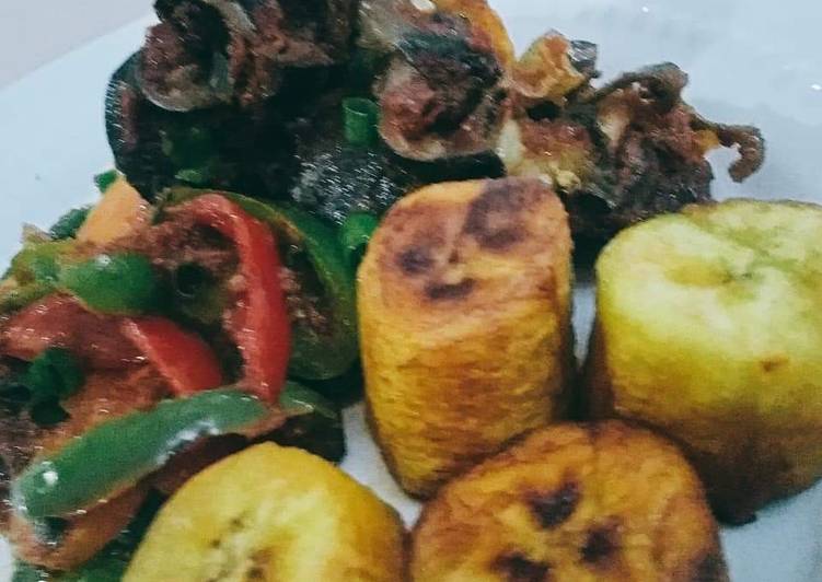 Fried plantain,and snails and vegetables