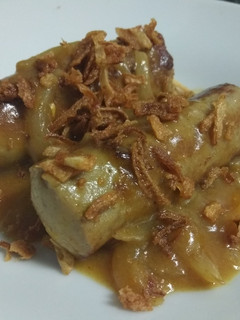 Una foto de Bratwurst al curry