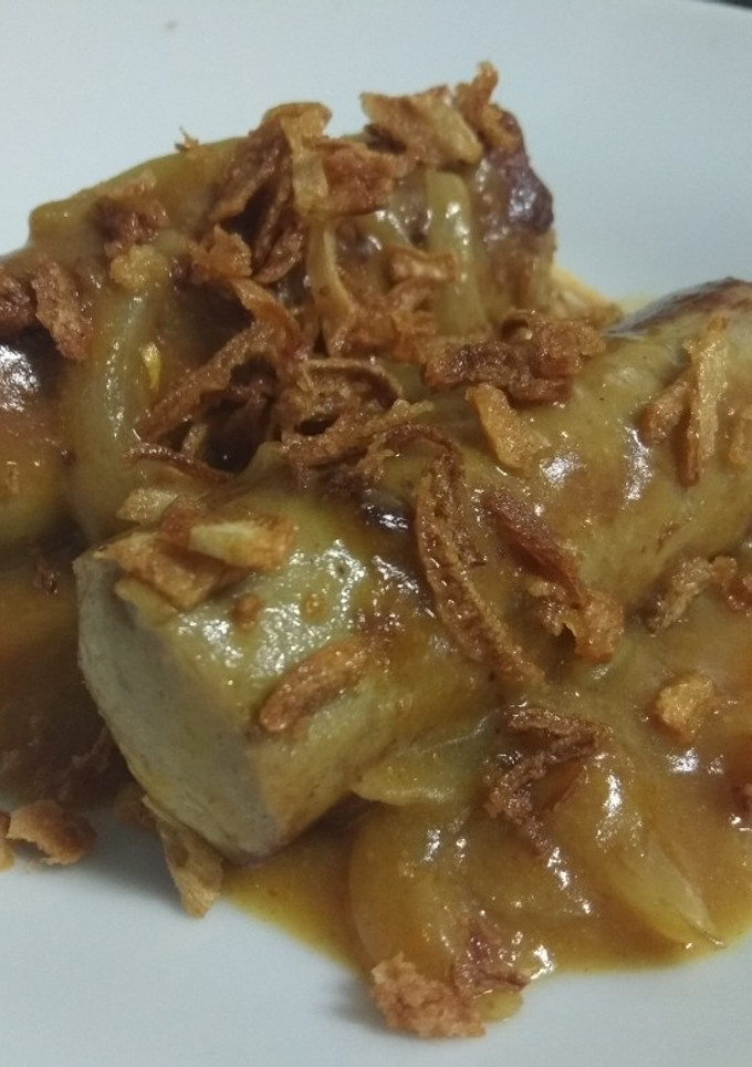 Una foto de Bratwurst al curry