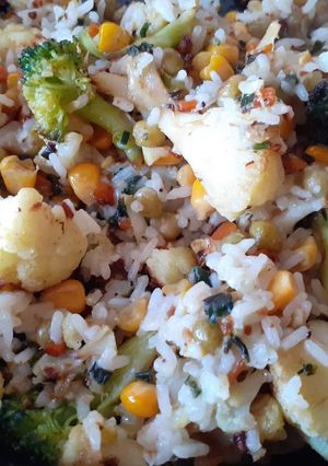 Una foto de Arroz, brócoli y coliflor